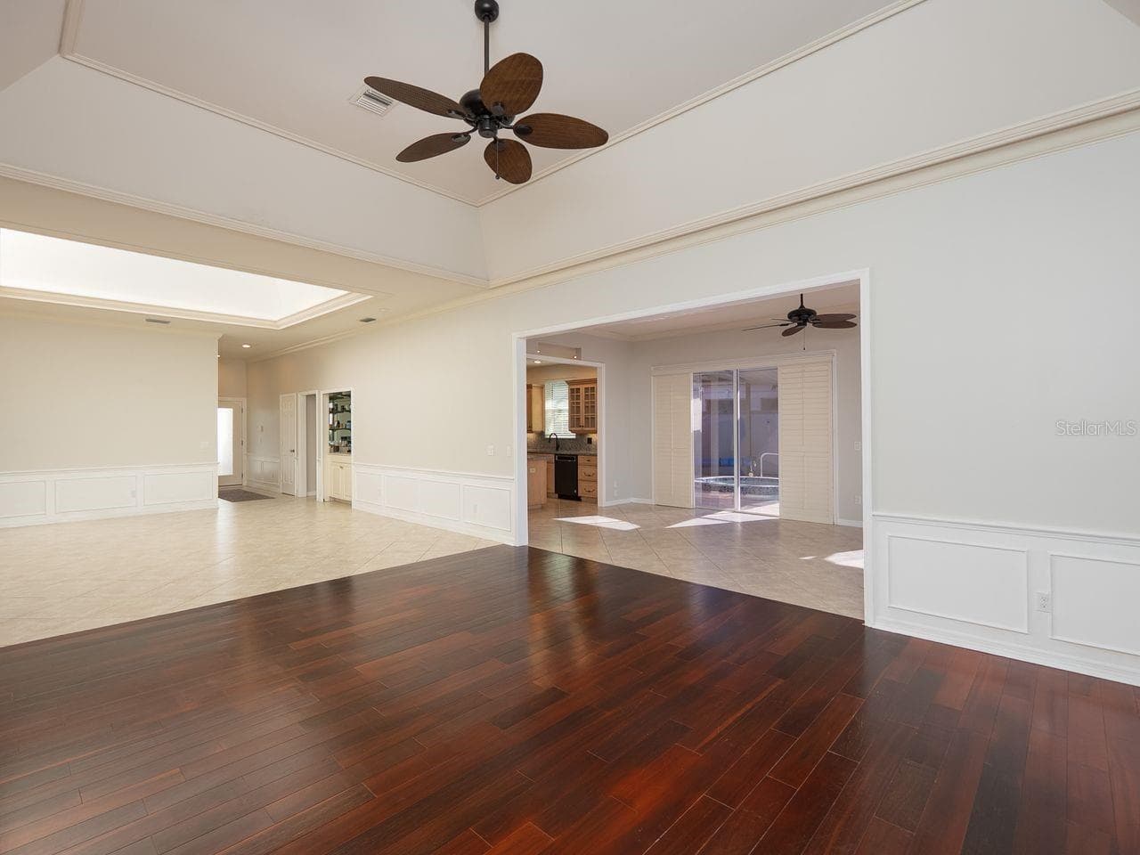 Formal living room and dining with opening to family room and kitchen - 71 CAYMAN ISLES BLVD, ENGLEWOOD