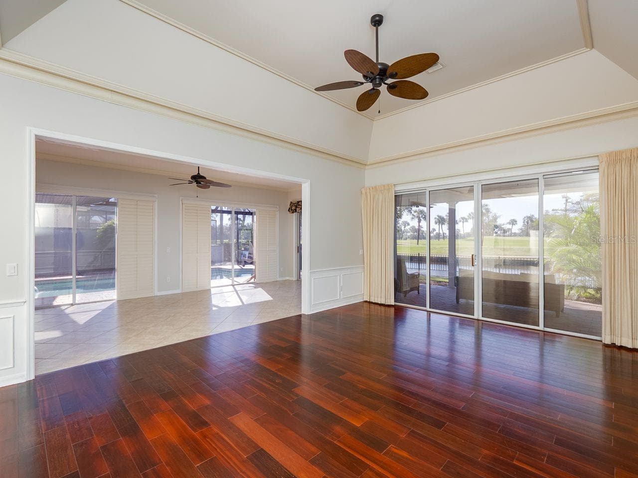 Living room looking into family room - 71 CAYMAN ISLES BLVD, ENGLEWOOD
