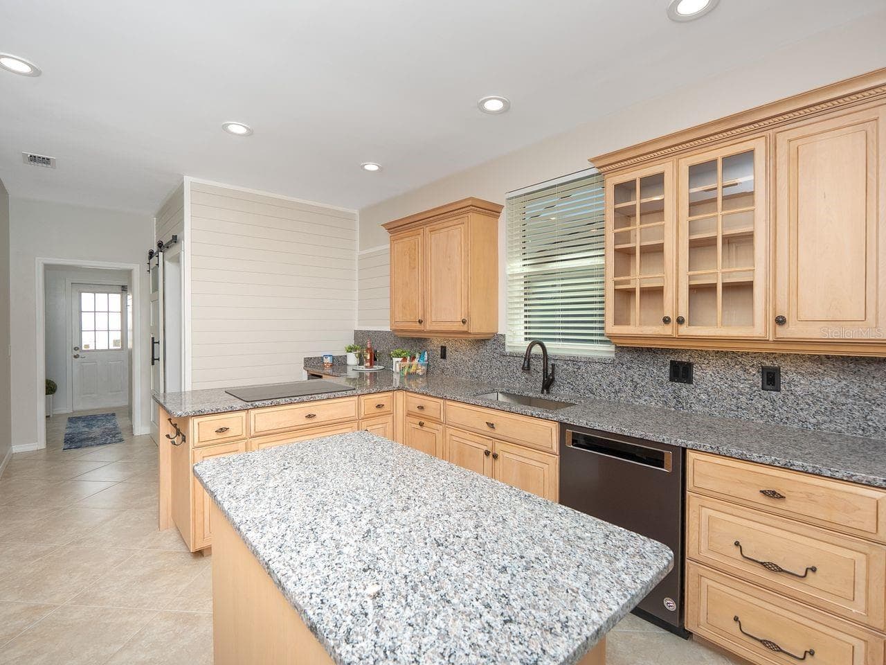 kitchen looking toward laundry room and side door - 71 CAYMAN ISLES BLVD, ENGLEWOOD
