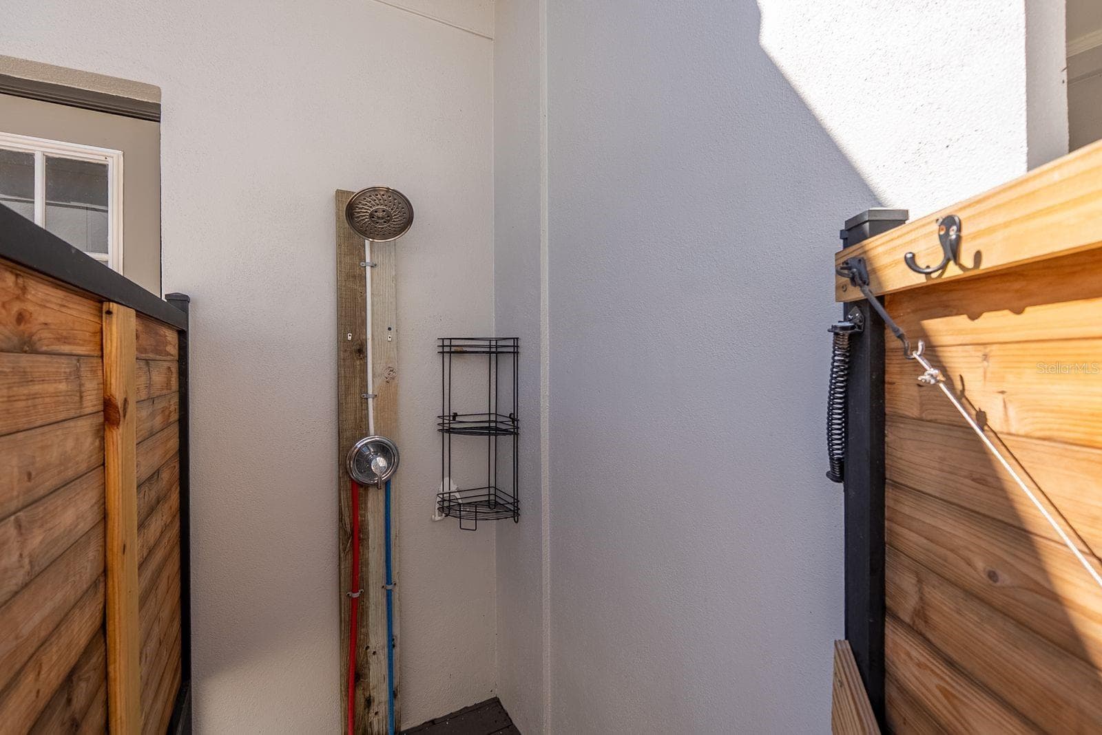 hot and cold water in outside shower - 71 CAYMAN ISLES BLVD, ENGLEWOOD