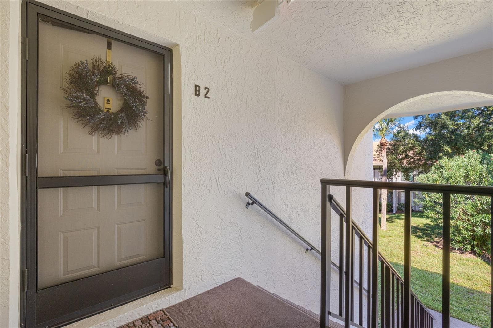 Front entrance - 1708 PINE RIDGE WAY E #B2, PALM HARBOR