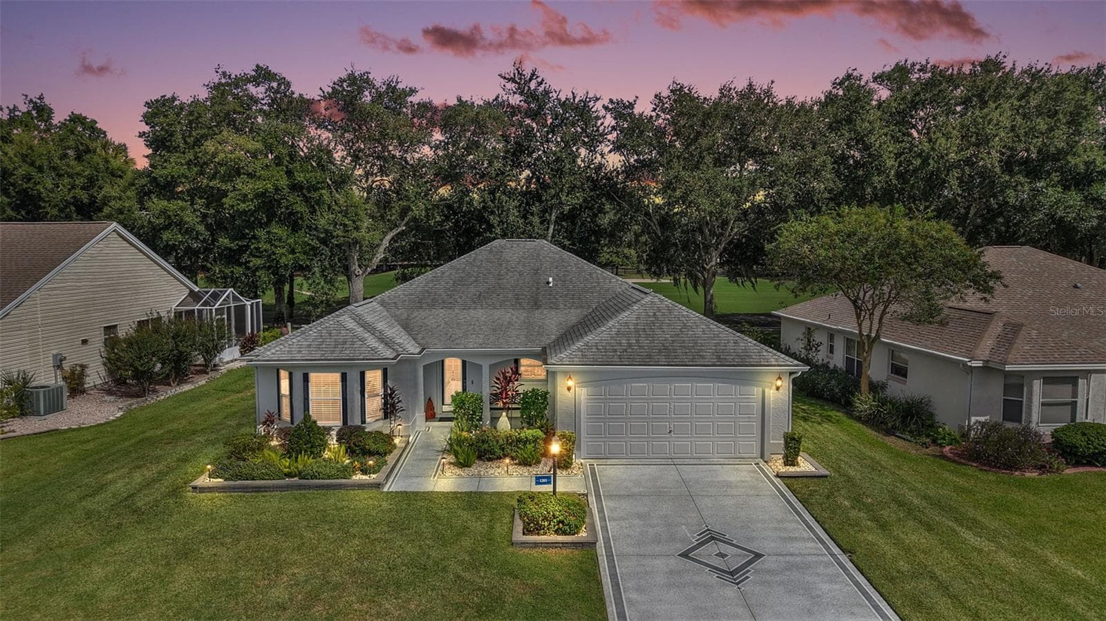 Twilight Front Elevation with Golf Front Views - 1201 BARCELONA DR, THE VILLAGES
