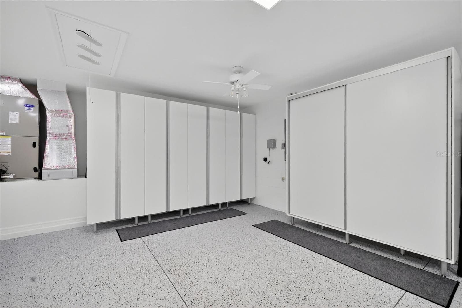 Garage with Custom Storage Closets - 1201 BARCELONA DR, THE VILLAGES