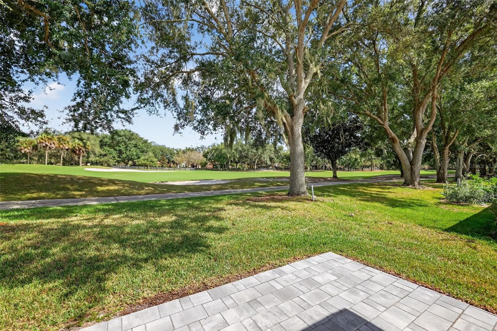 Rear Paver Patio Overlooking Golf Course - 1201 BARCELONA DR, THE VILLAGES