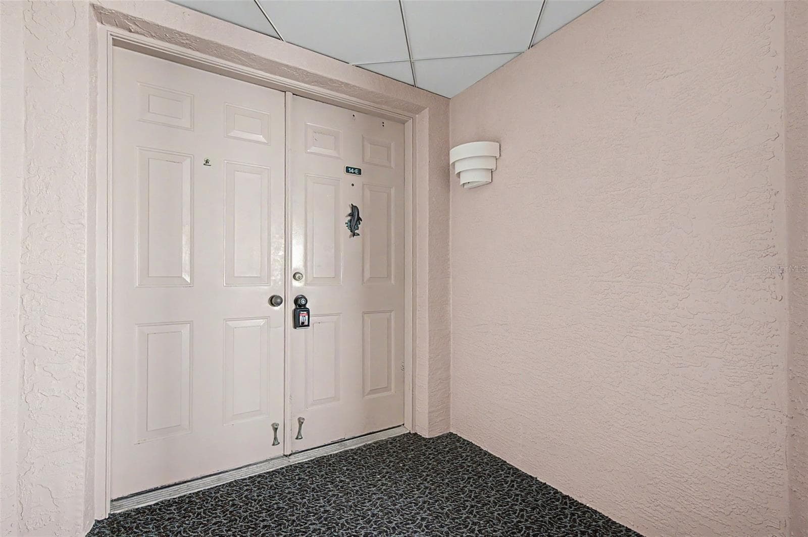 Exterior front entry door - 1310 GULF BLVD #14E, CLEARWATER