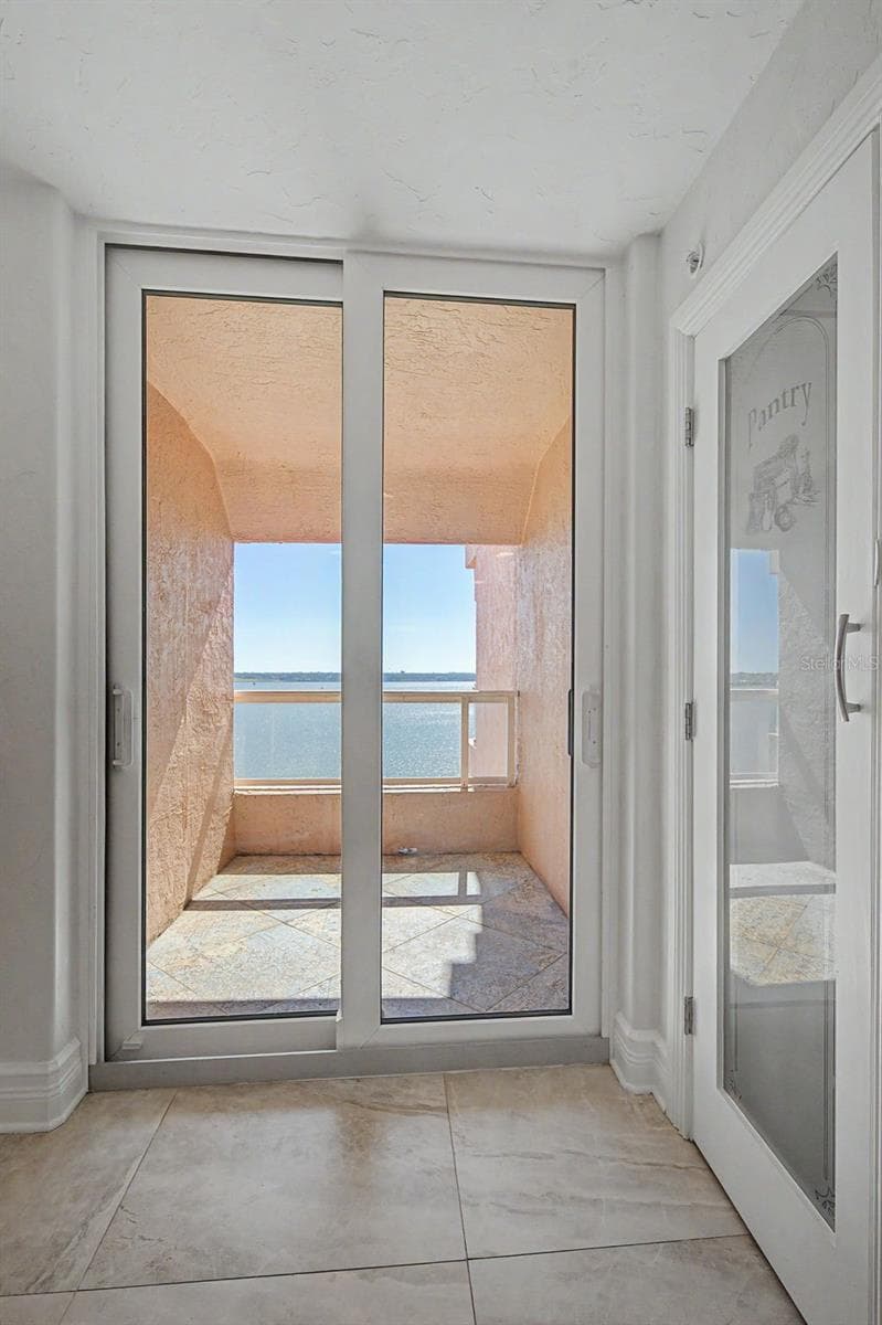 Intimate balcony off the eat-in Kitchen area - 1310 GULF BLVD #14E, CLEARWATER