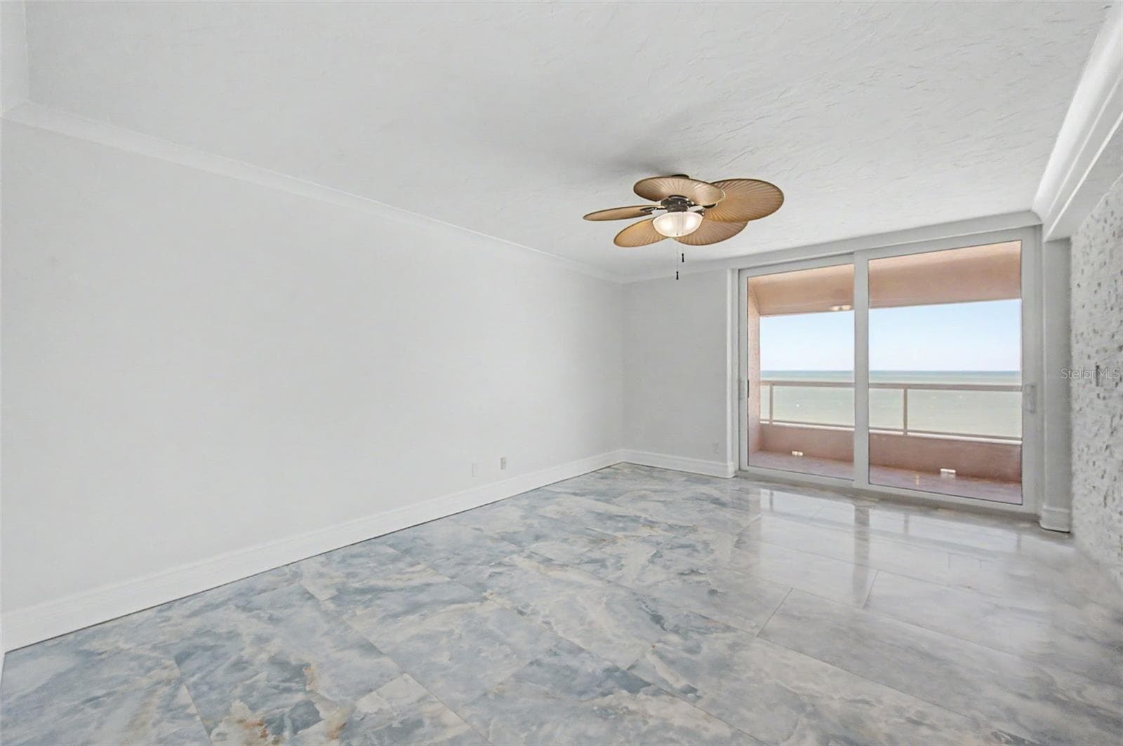 Primary Bedroom with access to the Gulf front Balcony - 1310 GULF BLVD #14E, CLEARWATER
