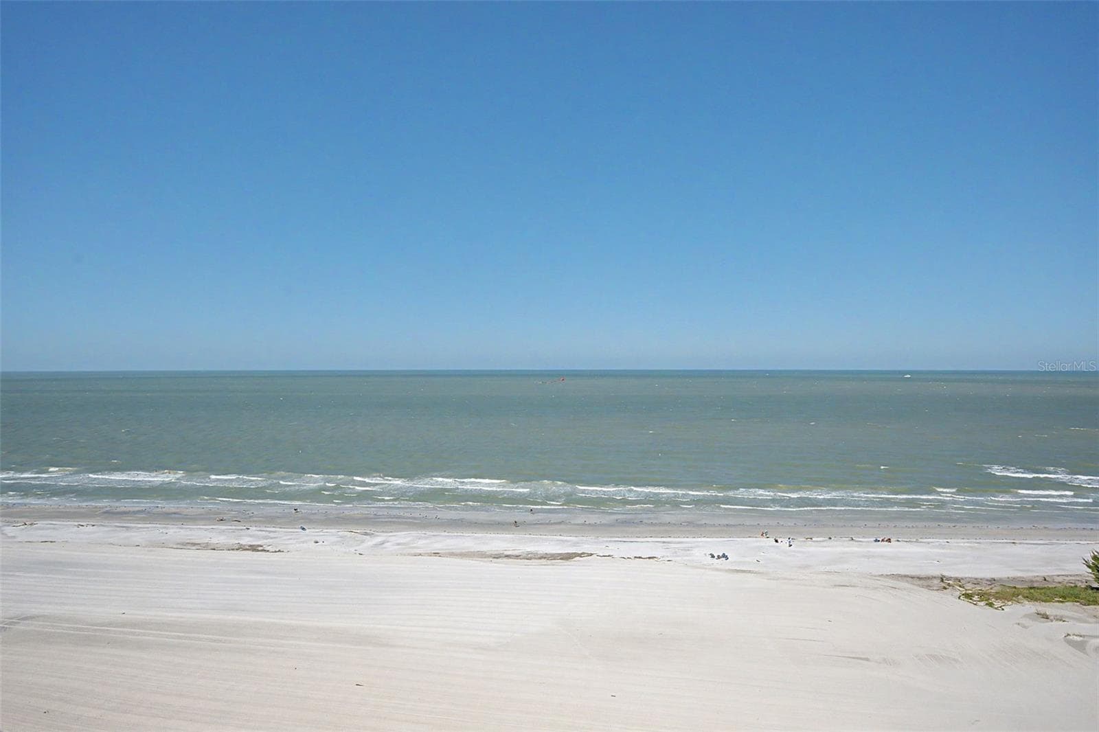 Views of the Gulf front from the Primary bedroom side of the balcony. - 1310 GULF BLVD #14E, CLEARWATER