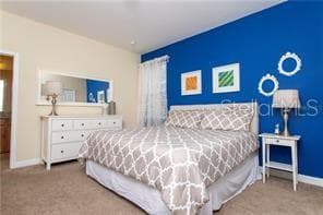 primary bedroom/Staged - 8985 CUBAN PALM RD. RD, KISSIMMEE