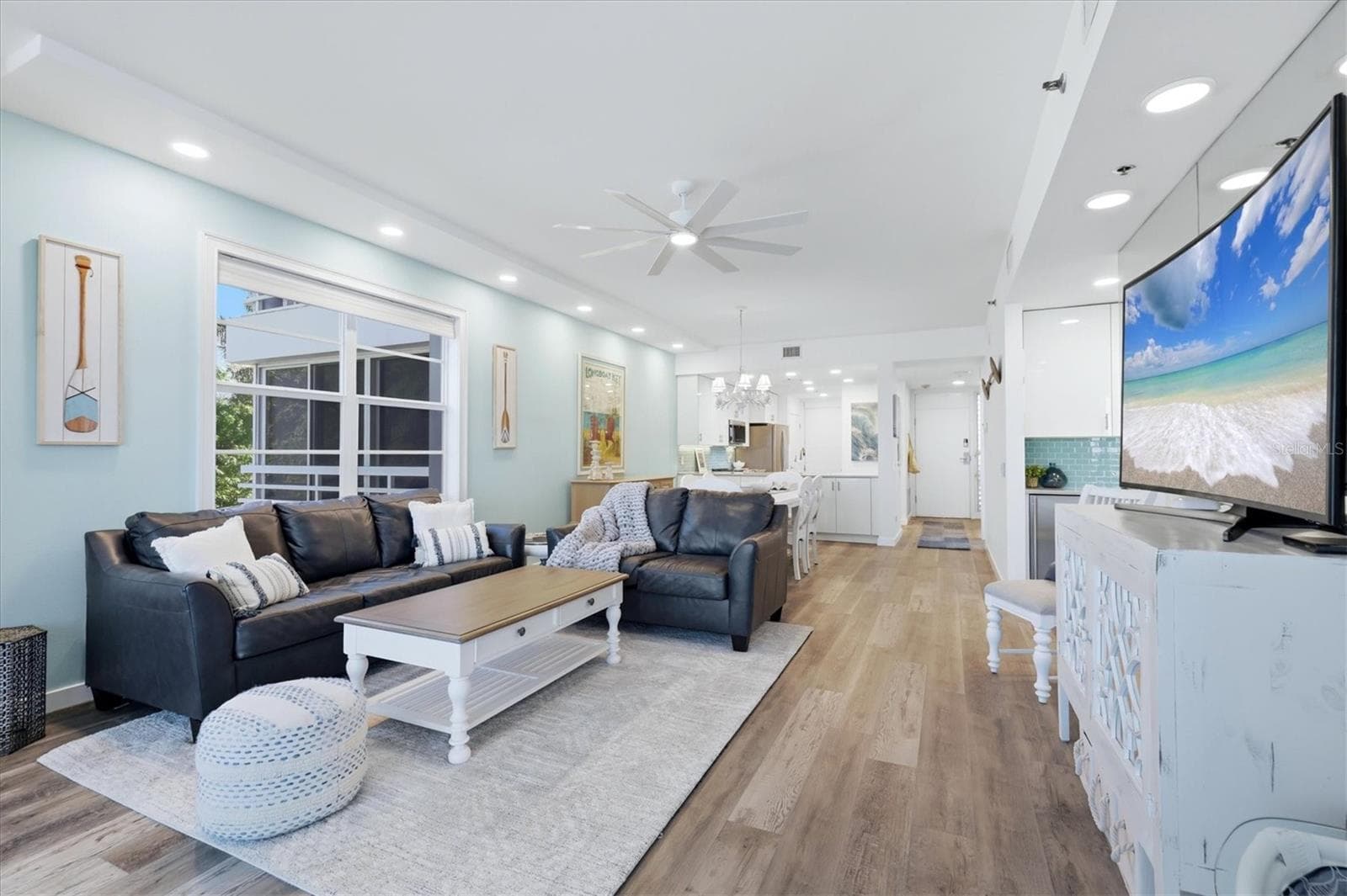Living room looking toward kitchen - 615 DREAM ISLAND PL #212, LONGBOAT KEY