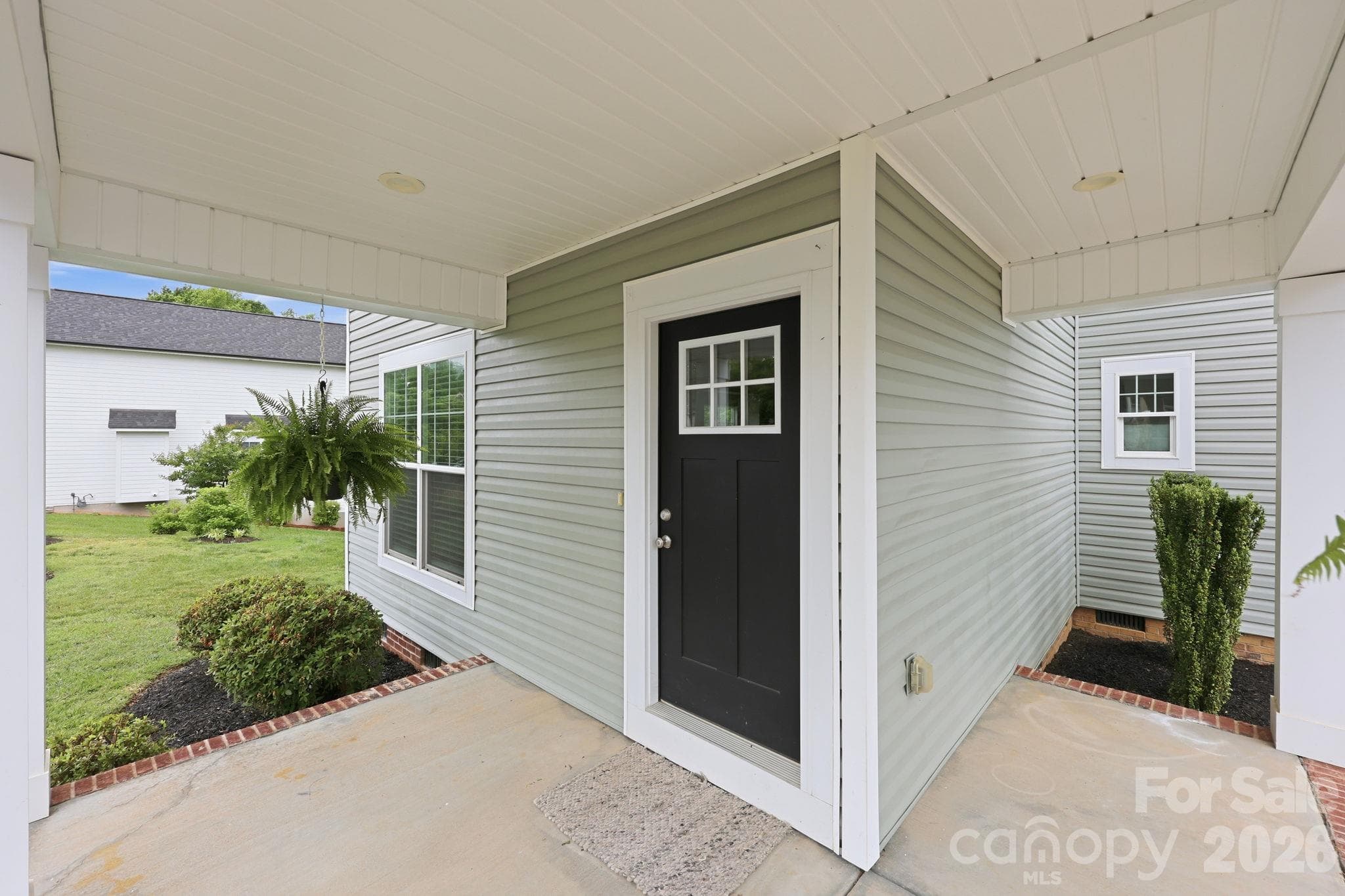 Single Family Residence at 8207 Dumphries Drive, Huntersville, photo 3 of 40