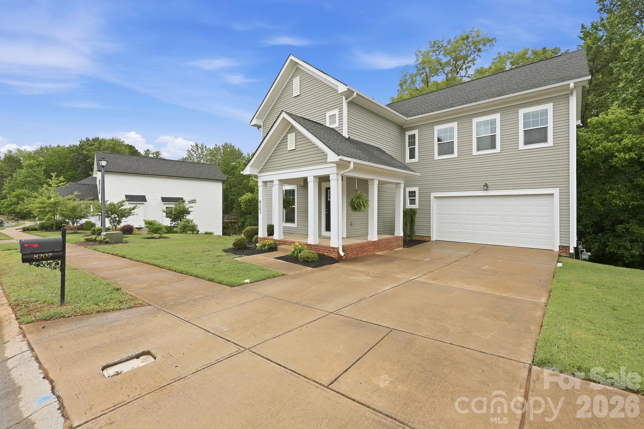 Single Family Residence at 8207 Dumphries Drive, Huntersville, photo 4 of 40