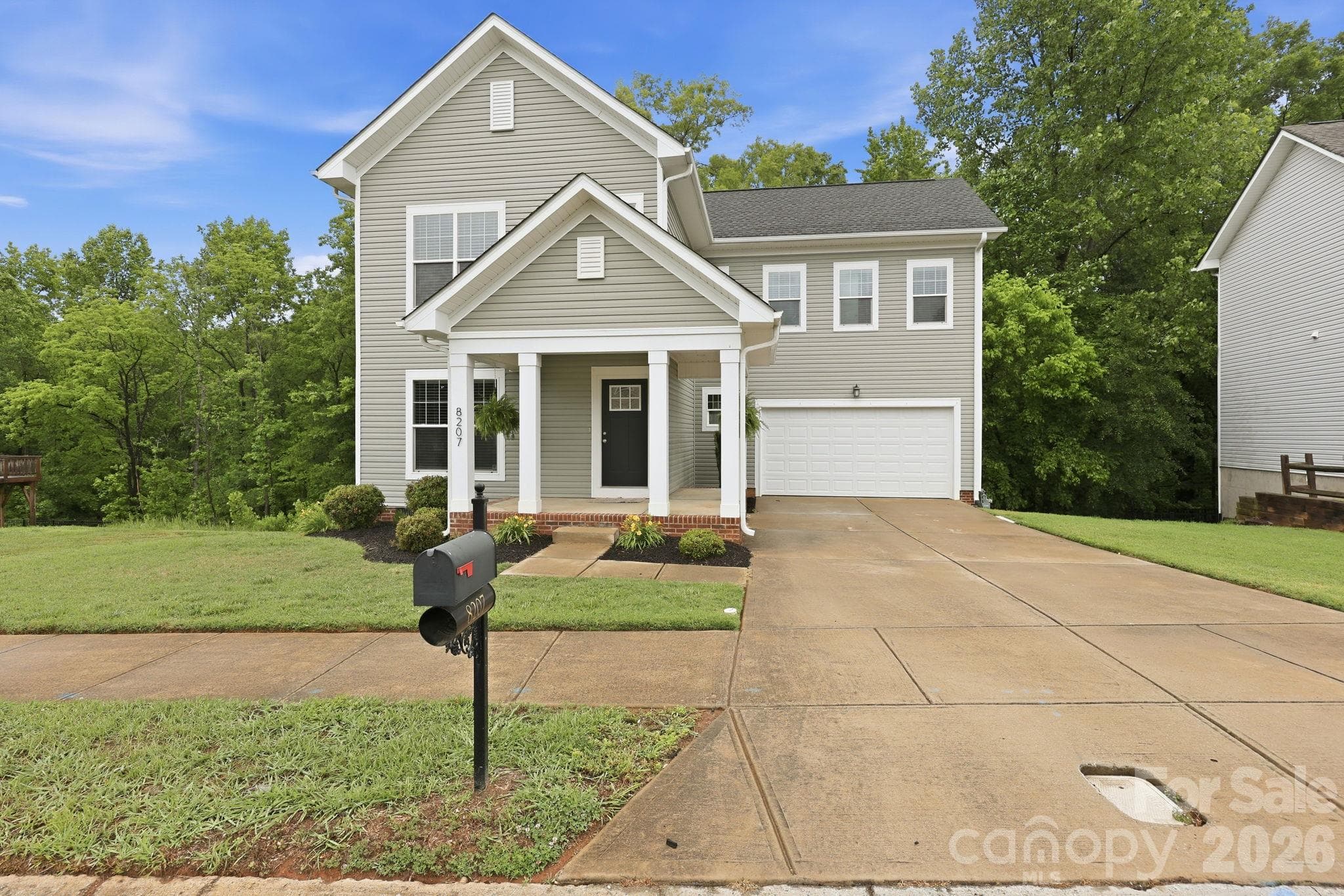Single Family Residence at 8207 Dumphries Drive, Huntersville, photo 5 of 40