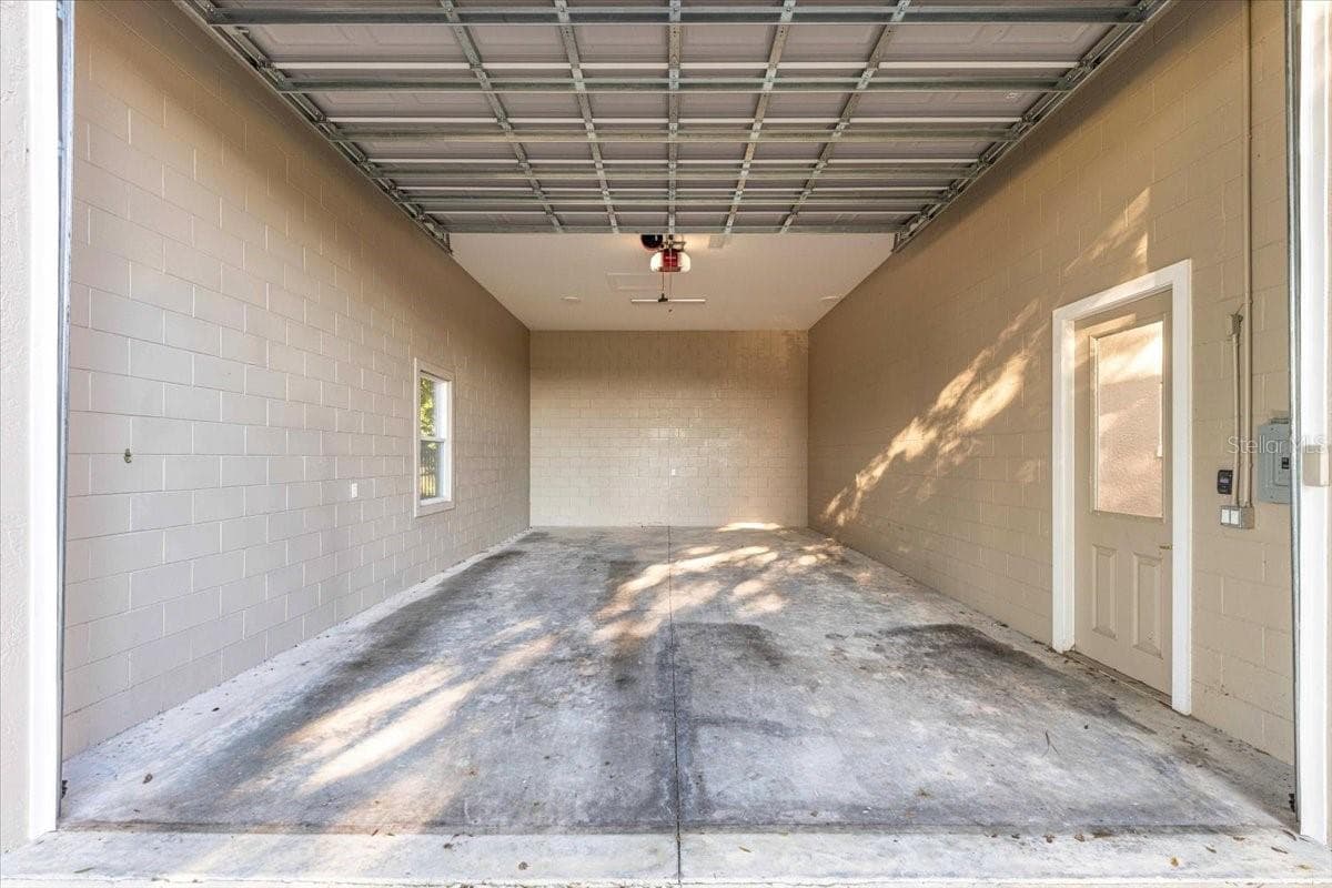 20'x32' Oversized Garage with 12 foot automatic door - 5592 NE 61ST AVENUE RD, SILVER SPRINGS
