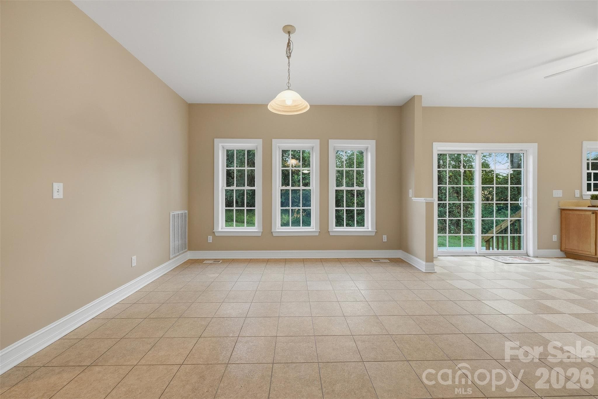Dining Area off of Kitchen with french doors leading to the back patio - 151 Robertson Drive, Taylorsville