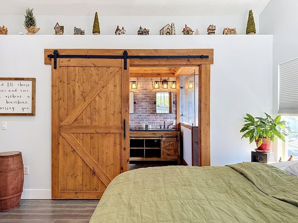 Barn Door and Brick Accent Wall - BRADEN RIVER LAKES, BRADENTON