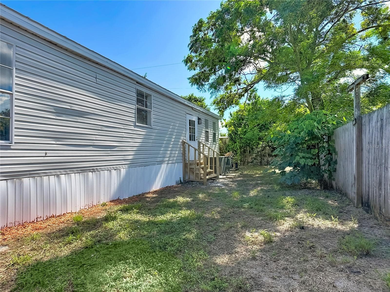 Manufactured Home at 3443 POPULATIC ST, MIMS, photo 15 of 65