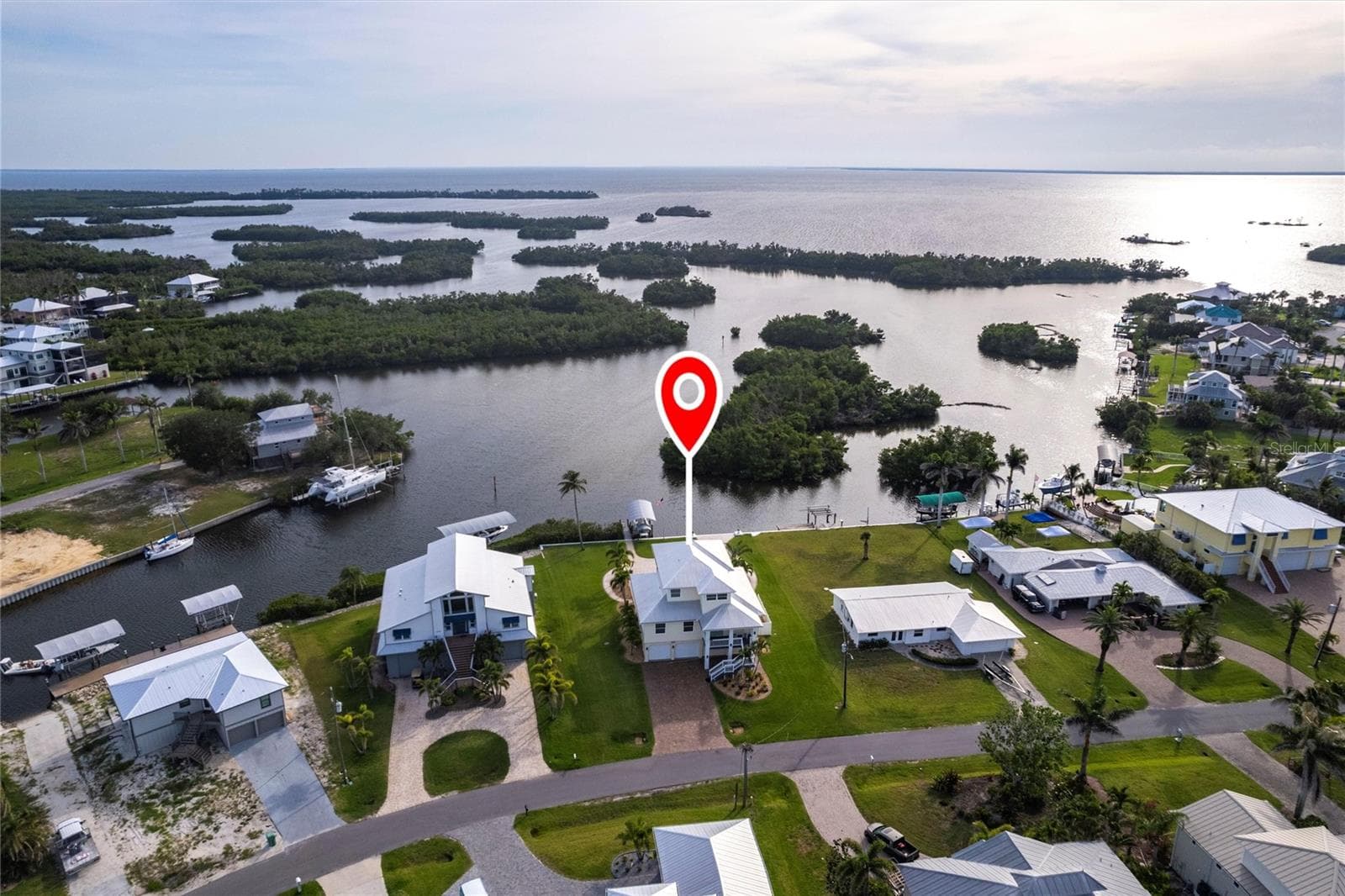 Single Family Residence at 24197 TREASURE ISLAND BLVD, PUNTA GORDA, photo 75 of 81