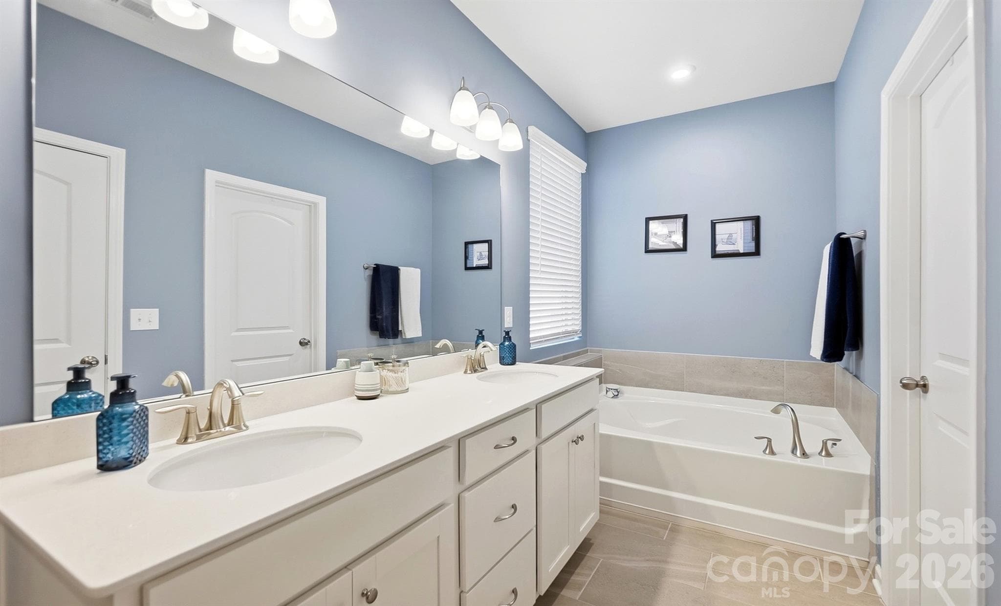Main Floor Primary Suite with Garden Tub & Shower - 1403 Laggan Lane, Indian Trail