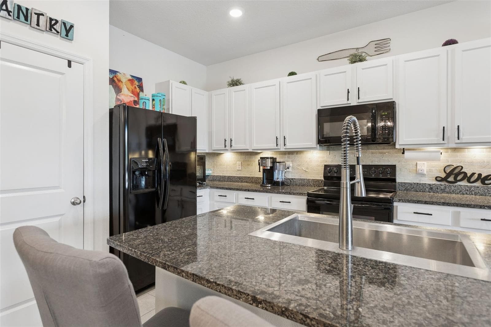 Townhouse at 2838 SUNCOAST BLEND DR, ODESSA, photo 10 of 32
