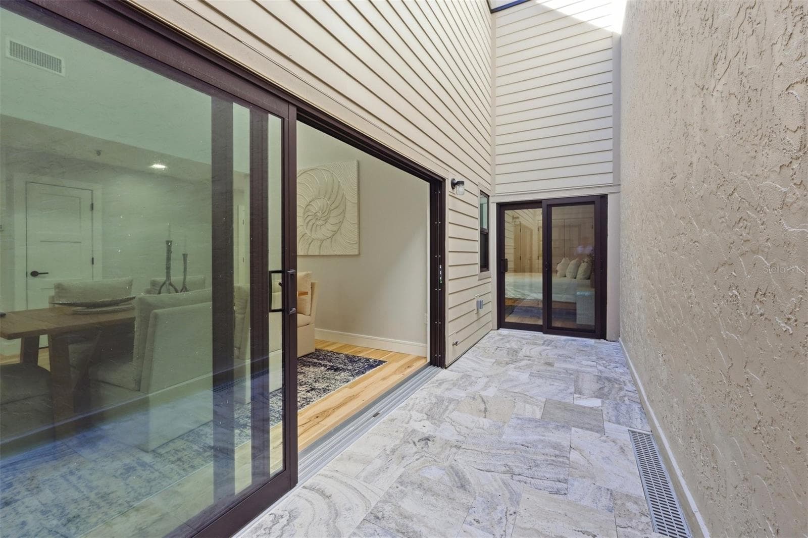 Atrium off the dining room for light and airflow - 2141 HARBOURSIDE DR #1203, LONGBOAT KEY