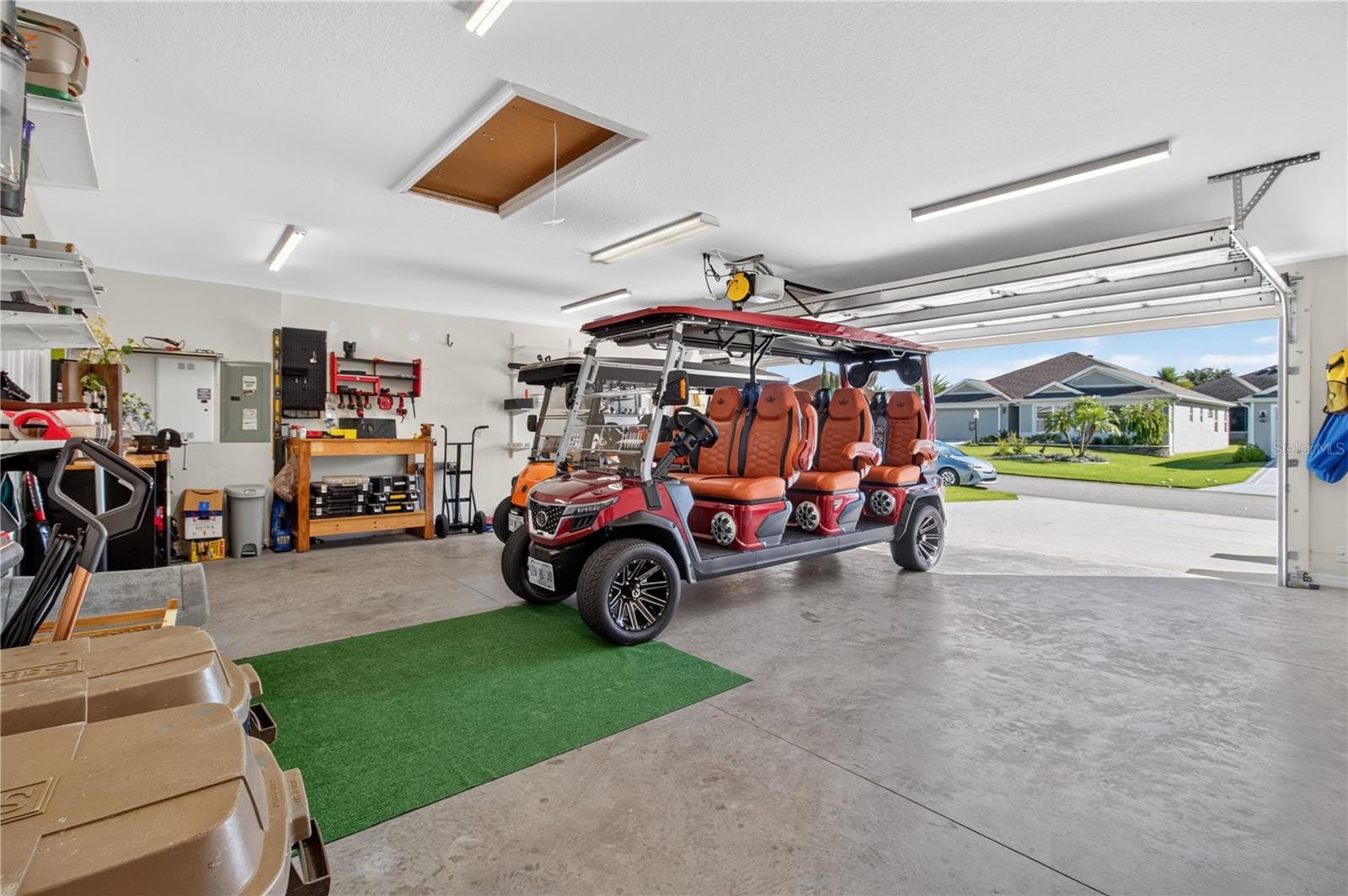Garage is nearly te same size as a car plus Golf car garage - 3342 VELTRE WAY, THE VILLAGES