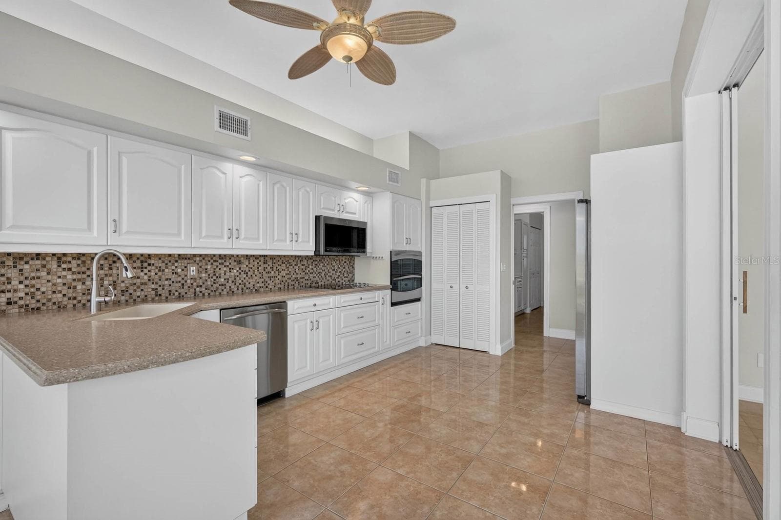 Bright Kitchen With Cabinetry - 74 COVINGTON LN, PALM COAST