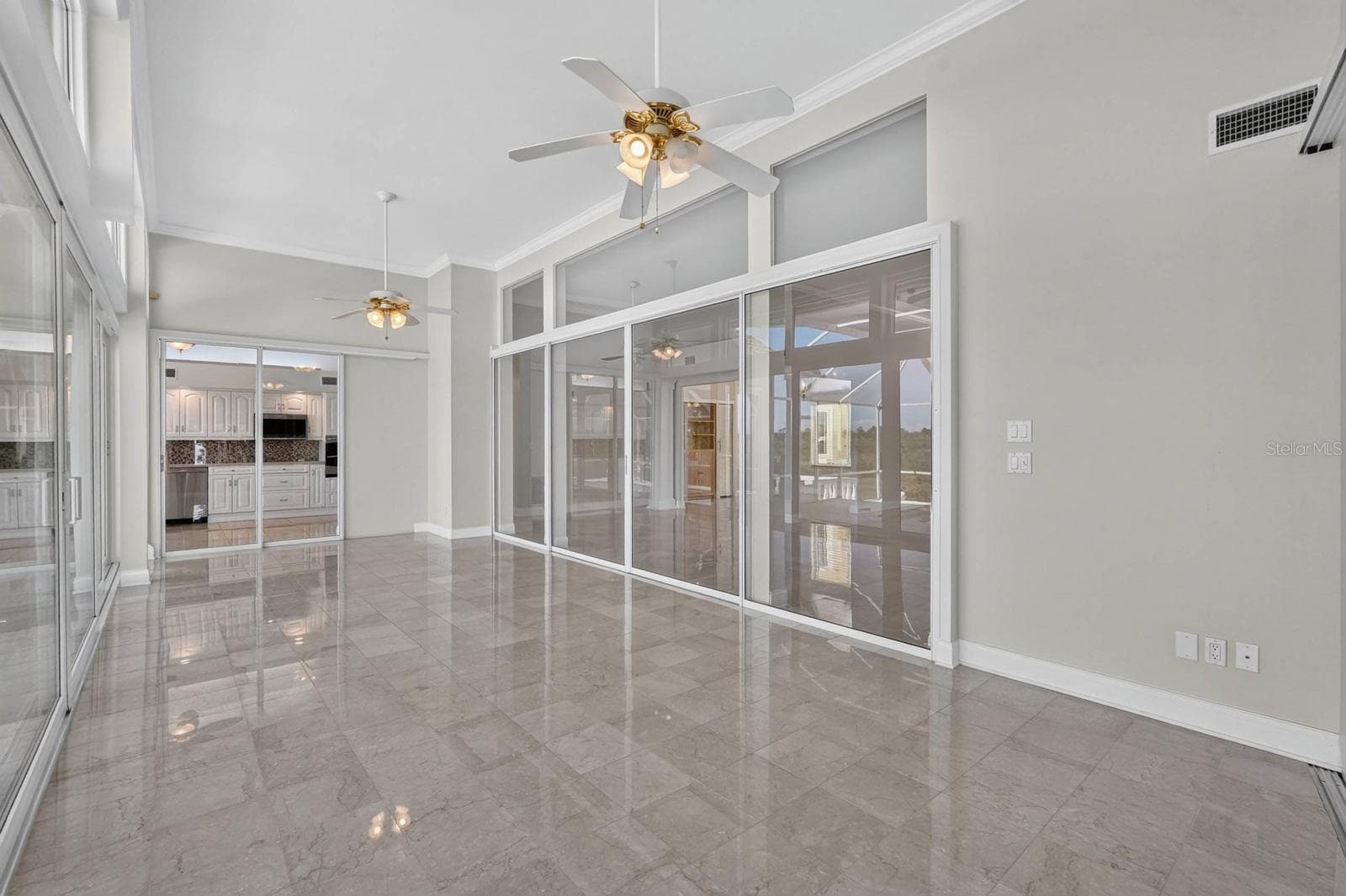 Expansive Florida Room Views - 74 COVINGTON LN, PALM COAST