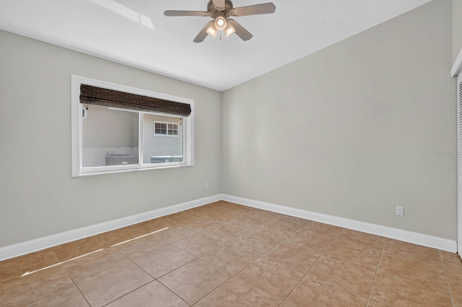 Bright Bedroom With Tile Flooring - 74 COVINGTON LN, PALM COAST