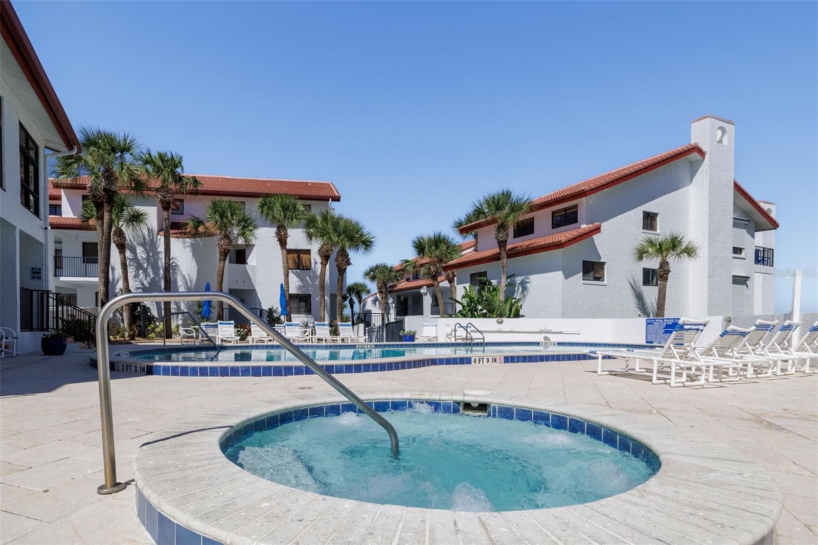 Spa & pool surrounded by spacious deck to relax & enjoy! - 3001 S ATLANTIC AVE #531, NEW SMYRNA BEACH