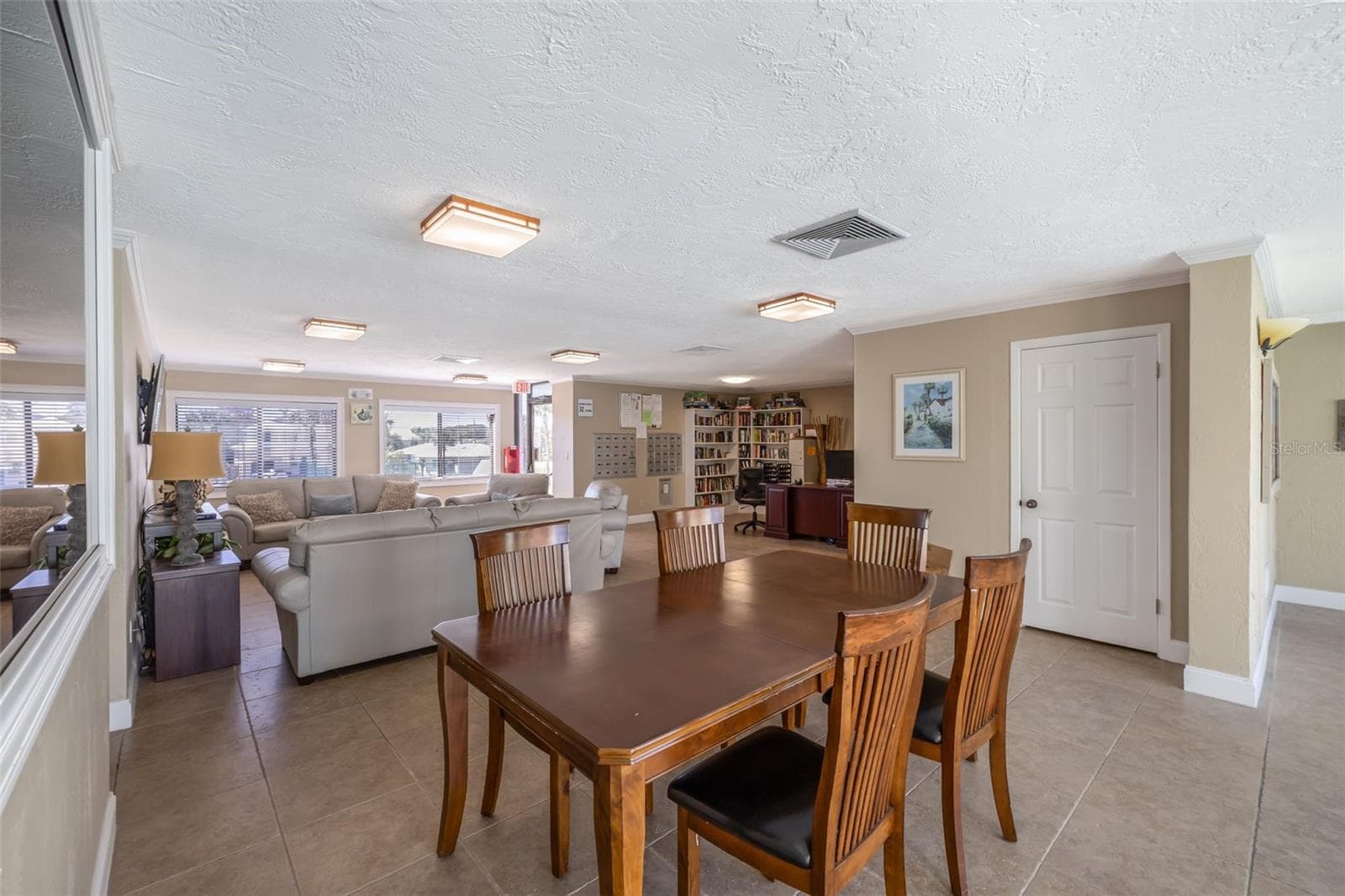 Clubhouse overlooks pool & spa. - 3001 S ATLANTIC AVE #531, NEW SMYRNA BEACH
