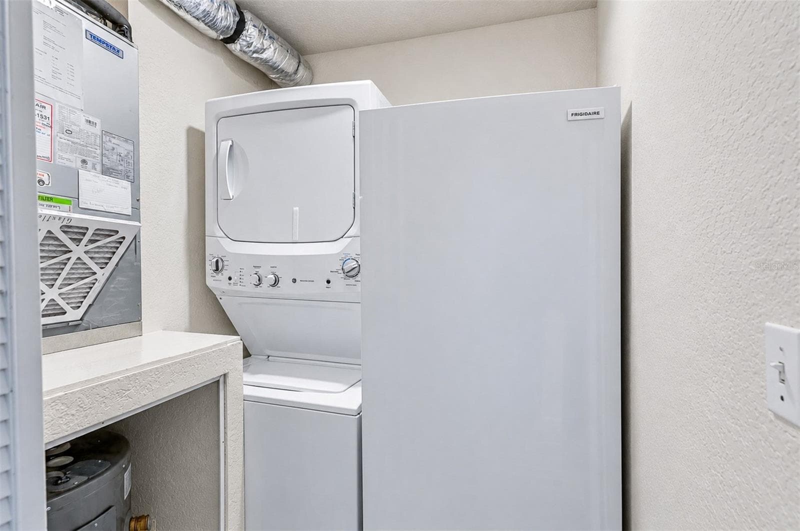Laundry room - freezer does not convey - 406 BOUCHELLE DR #103, NEW SMYRNA BEACH