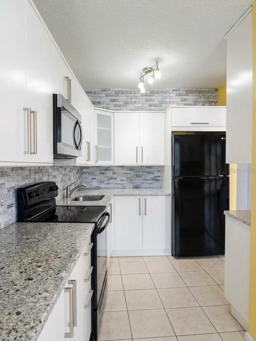 MODERN UPDATED KITCHEN - 4985 COBIA DR SE #B, ST PETERSBURG