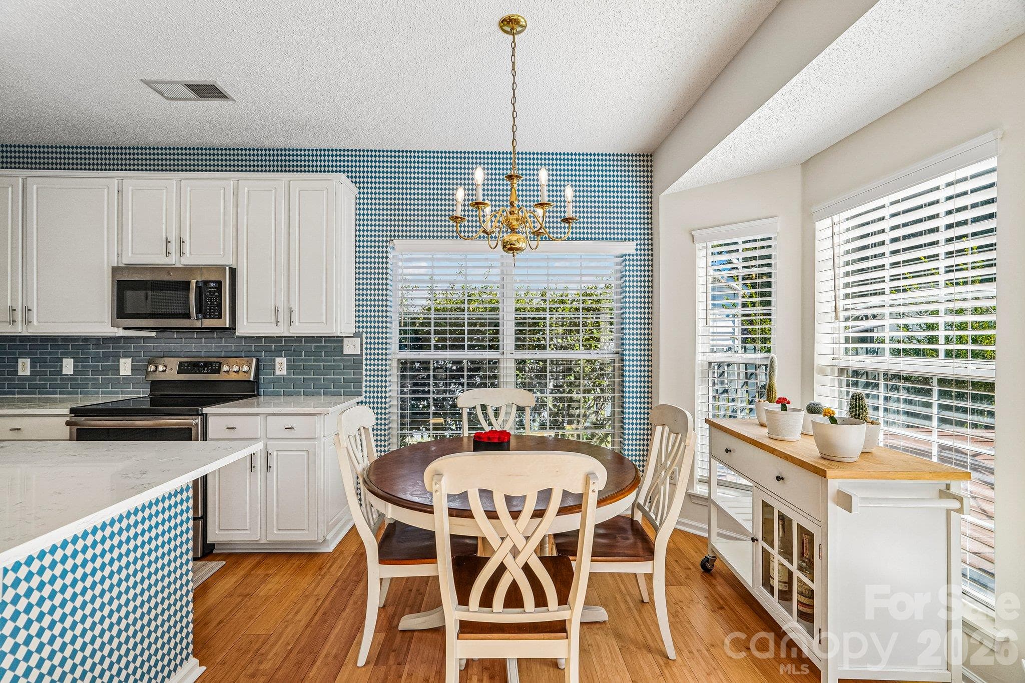 Dining area with bay window. - 11207 Livingston Mill Road, Charlotte
