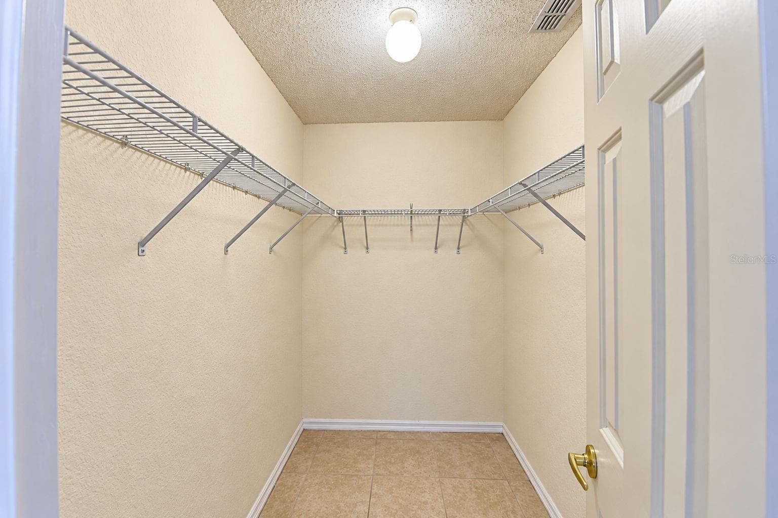 walk-in closet master bedroom - 3630 WELSCH WAY, LAKELAND