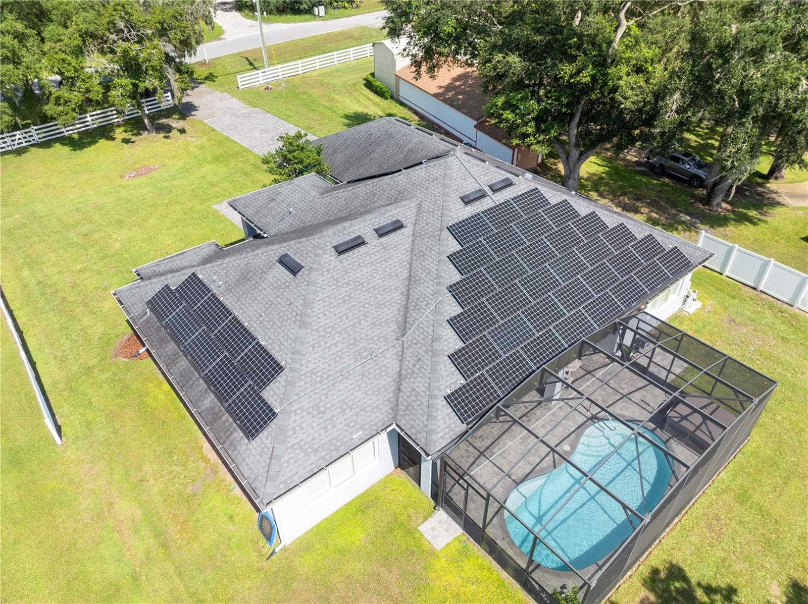 Aerial of home showing solar panels. Current homeowner does not have an electric bill - 590 EDEN DR, ST CLOUD
