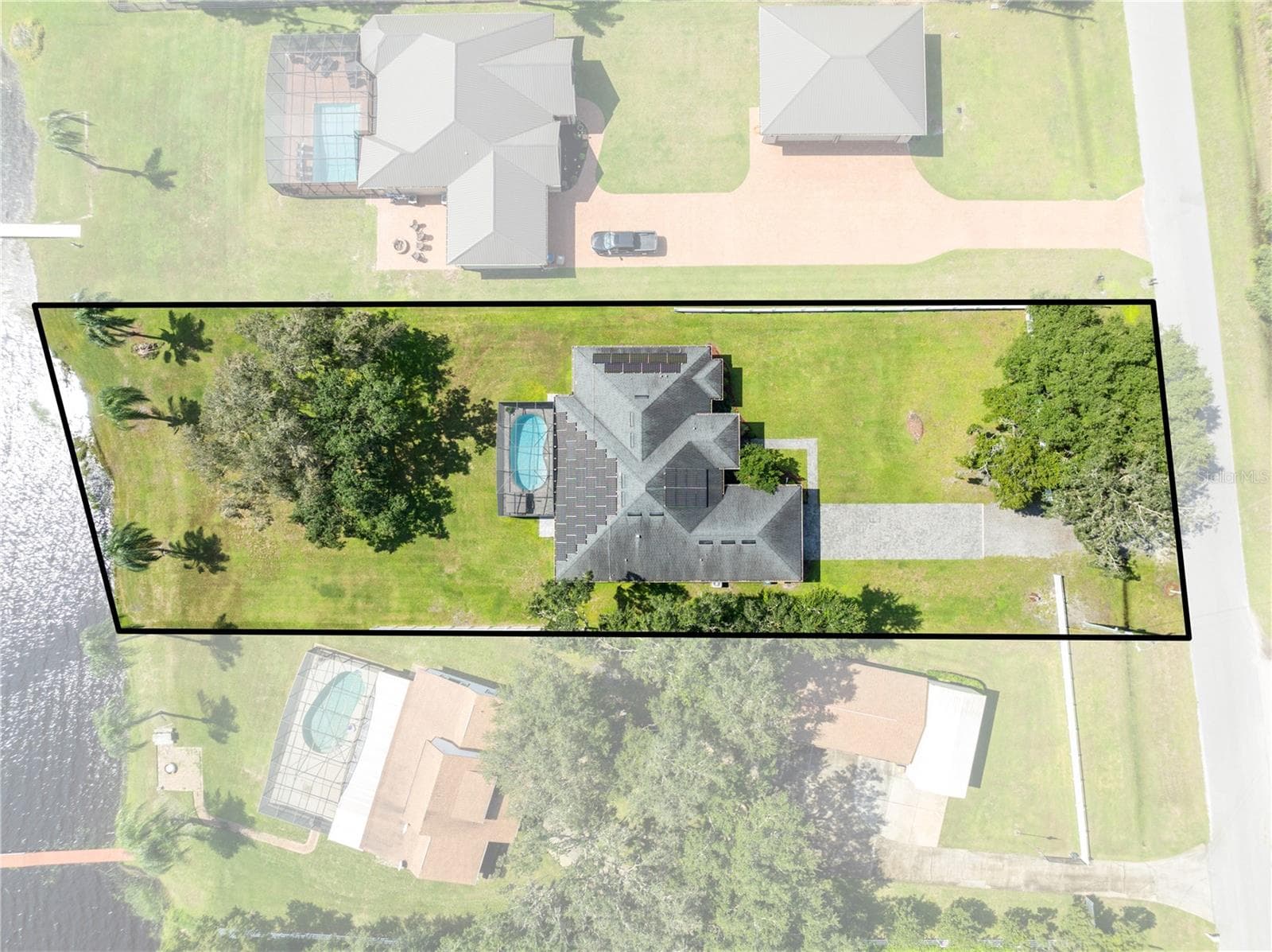 Aerial with approximate property lines. - 590 EDEN DR, ST CLOUD