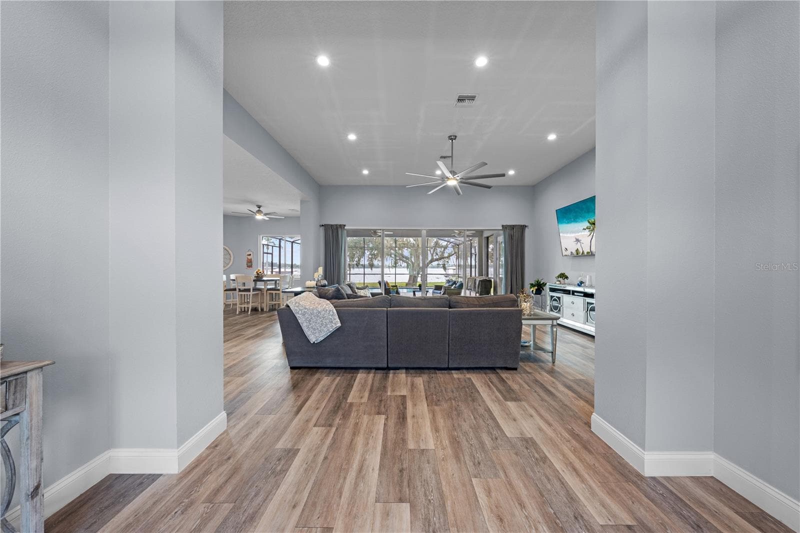 Enjoy this view of the lake immediately as you walk through the front door. - 590 EDEN DR, ST CLOUD