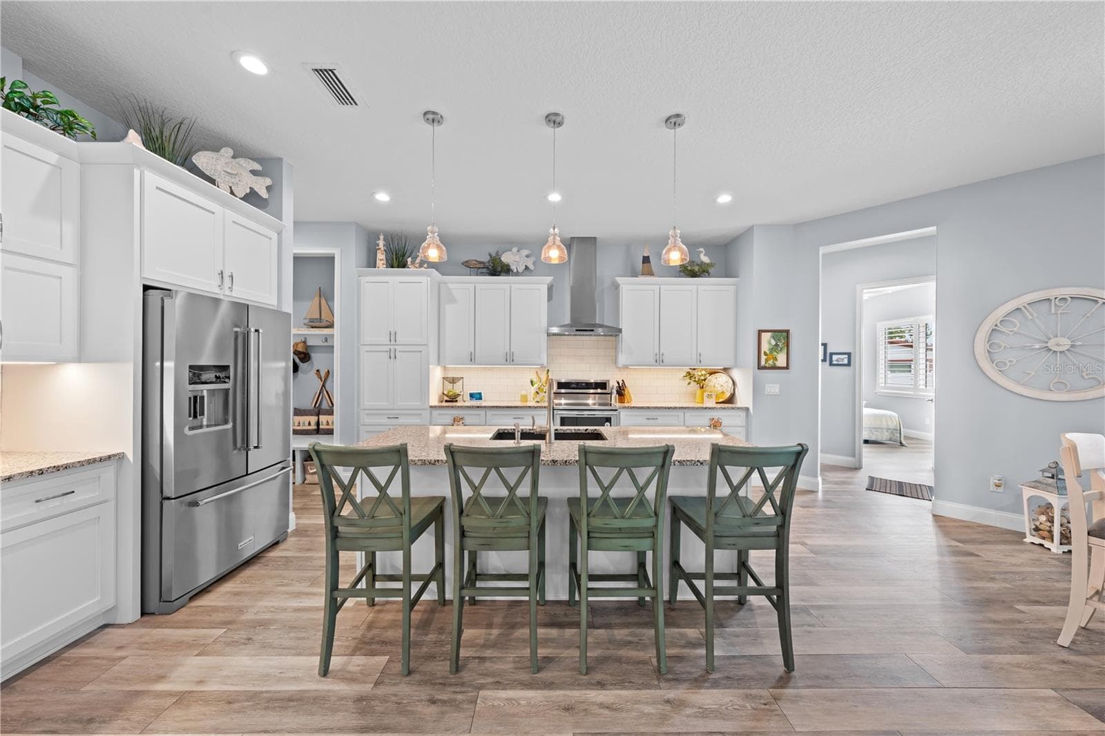 Kitchen Island with bar. - 590 EDEN DR, ST CLOUD
