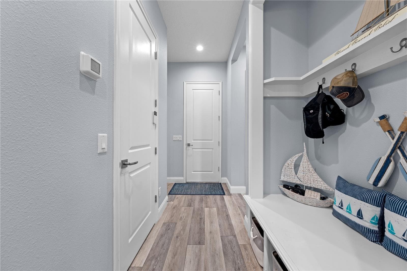 Leading to the garage with mudroom to the right. - 590 EDEN DR, ST CLOUD