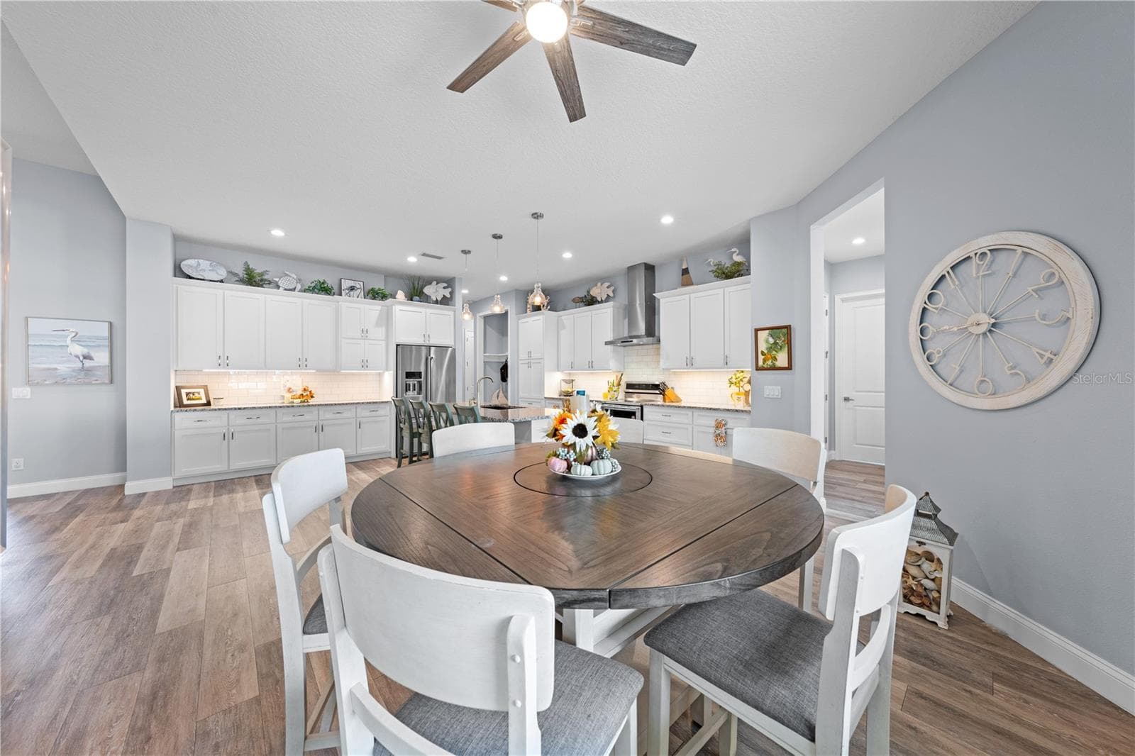 Dinette with a great view of the lake. - 590 EDEN DR, ST CLOUD