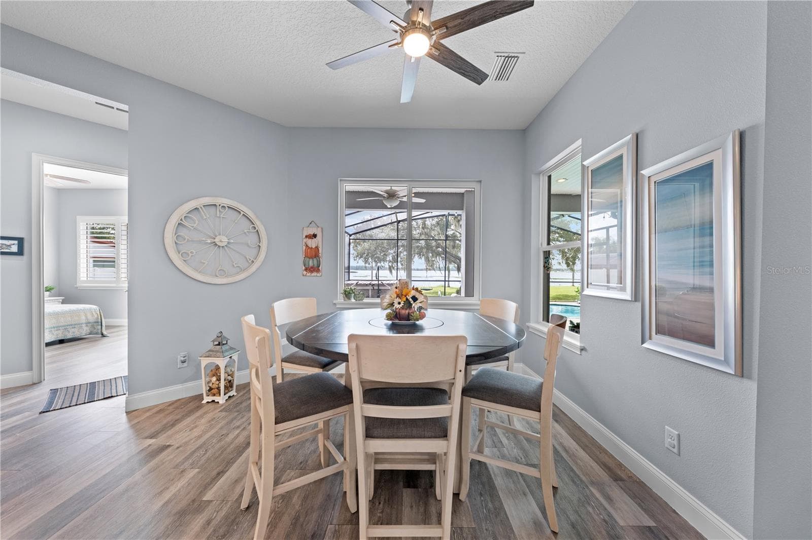 Dinette with a great view of the lake. - 590 EDEN DR, ST CLOUD