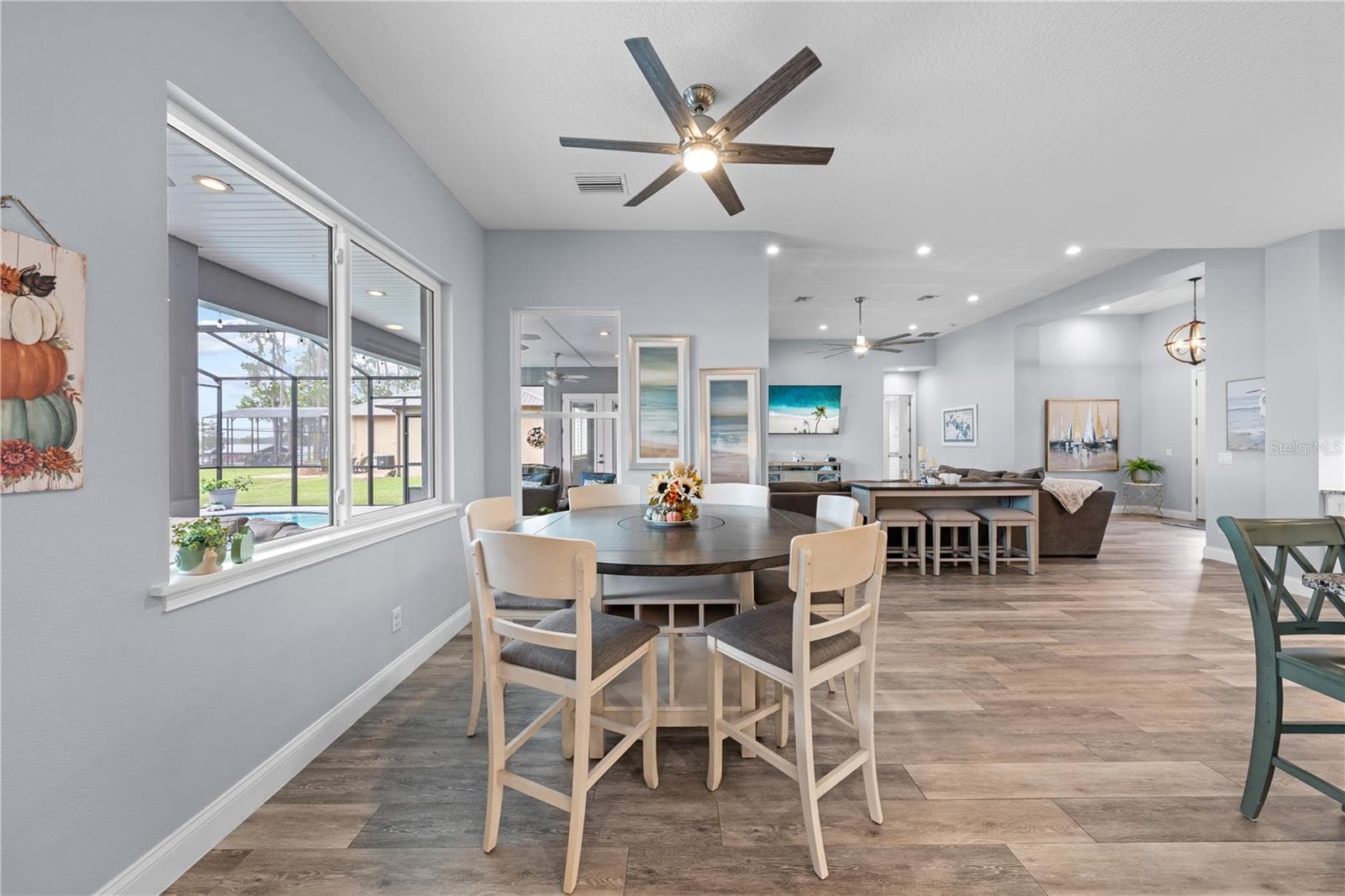 Dinette with a great view of the lake. - 590 EDEN DR, ST CLOUD