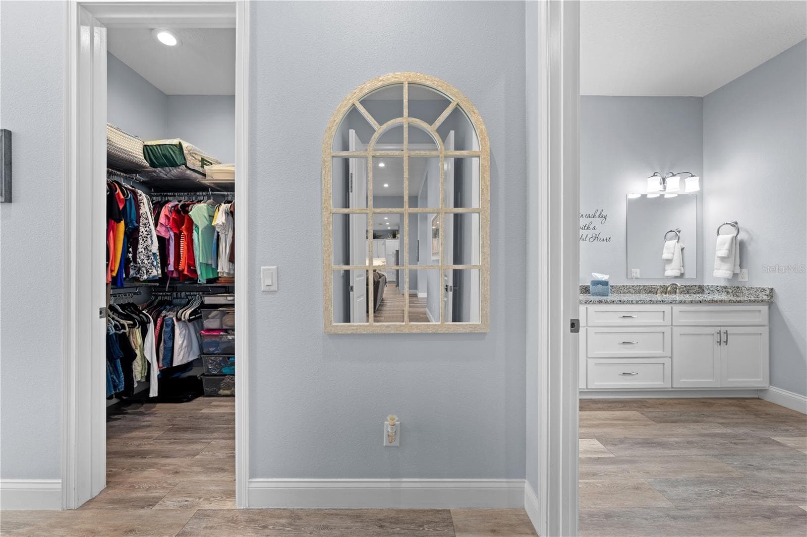 Primary Suite with Primary bathroom to the right and 1 of 2 closests. - 590 EDEN DR, ST CLOUD