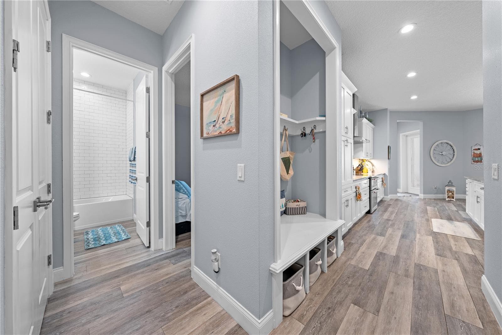 Just off the mudroom and kitchen is bedroom 3 with its own ensuite bathroom. - 590 EDEN DR, ST CLOUD