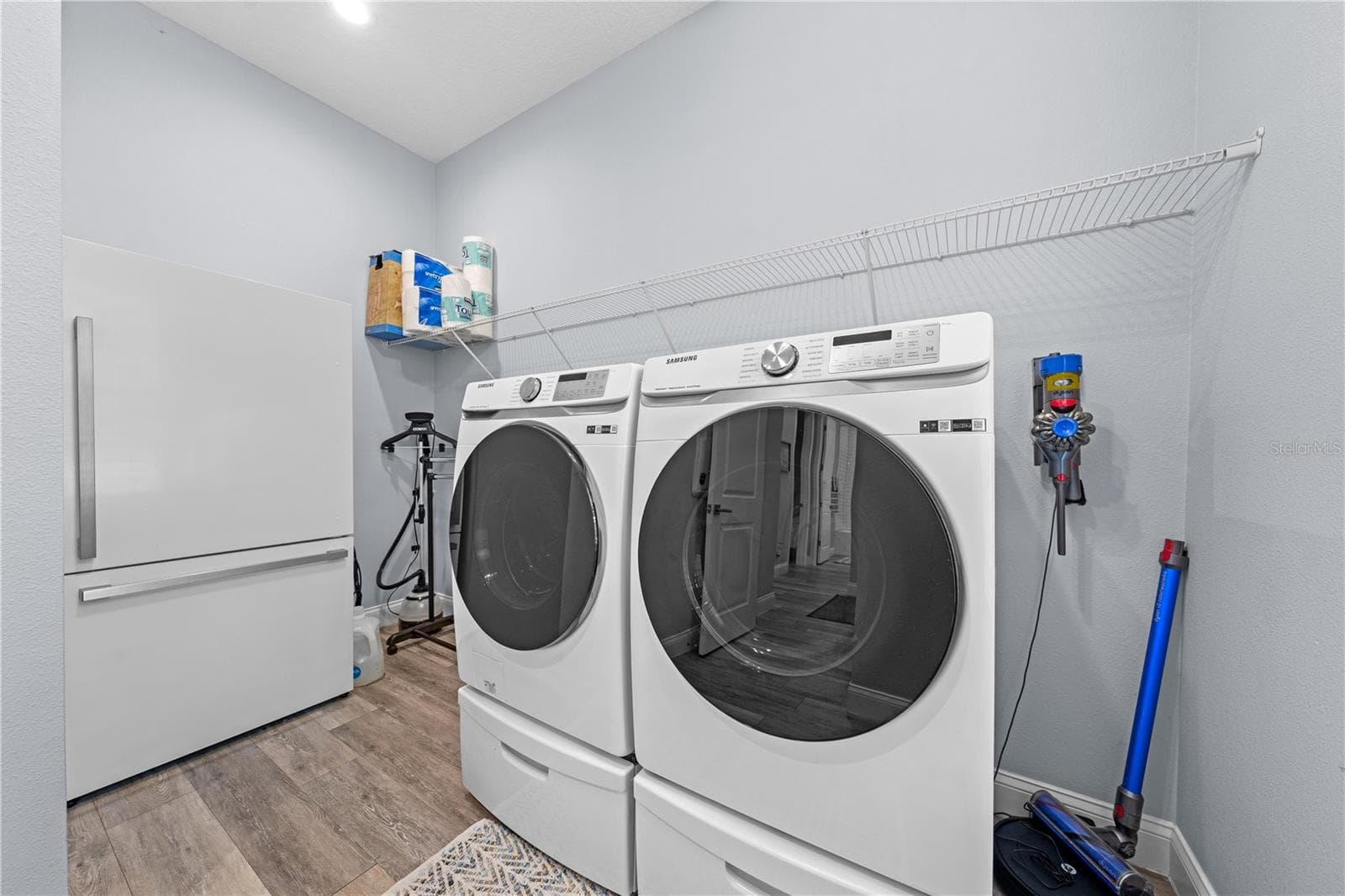 Laundry room and it is plumbed for a sink. - 590 EDEN DR, ST CLOUD