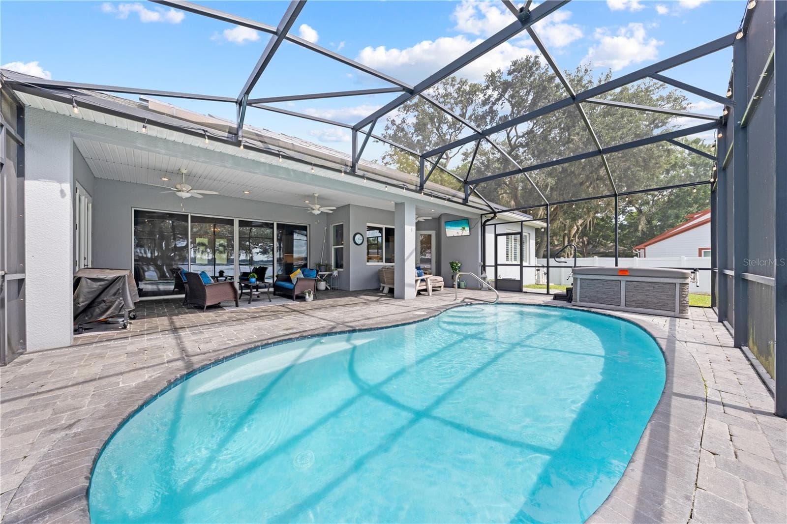 Chlorine pool heated with electric and jacuzzi - 590 EDEN DR, ST CLOUD