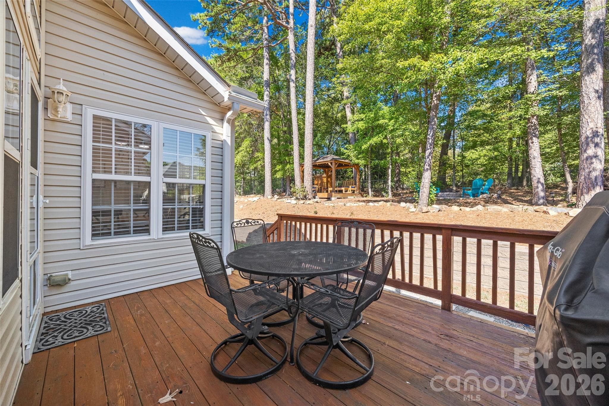 The back yard deck area is the perfect spot for your morning coffee - 1718 Sanridge Wind Lane, Charlotte