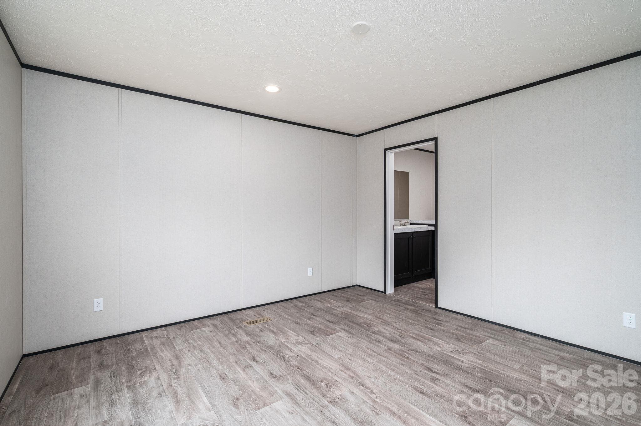 Primary Bedroom looking towards bathroom - 207 Grassy Field Court, Lawndale