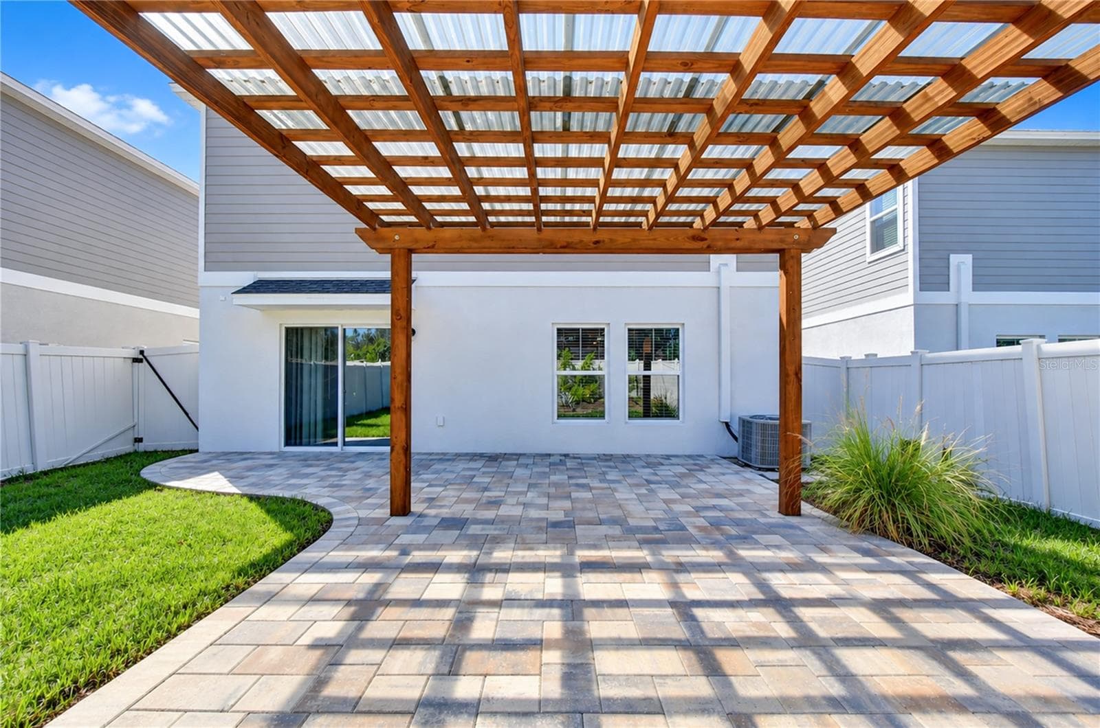 Patio and gazebo provide a welcoming setting for gatherings with family and friends. - 11484 BROOK EDGE AVE, RIVERVIEW